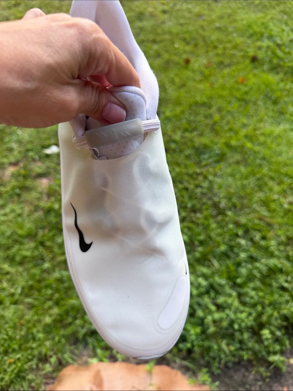 Nike Men’s White Slip-On Sneakers with Black Swoosh